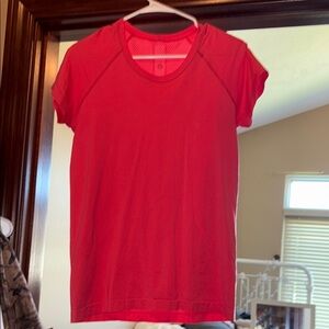 Women's coral Short Sleeve hip length Swiftly Tech